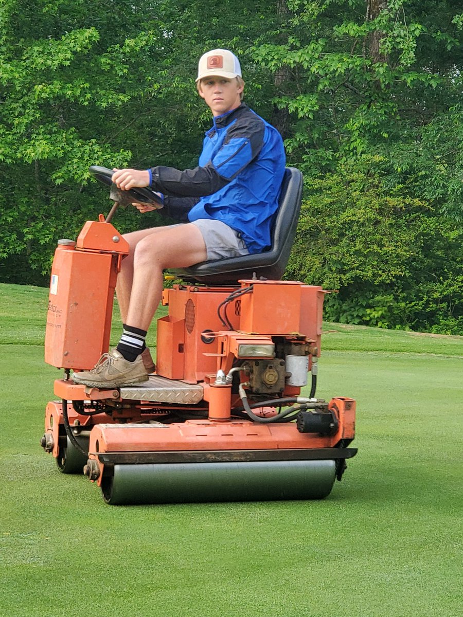 pattyice67's tweet photo. Been training this young man how to roll greens and he is getting better with every green he gets on. #trainingday #rollingreens #golf #fridaymorning #lovewhatyoudo #postivevibes https://t.co/5FPXSbP83c