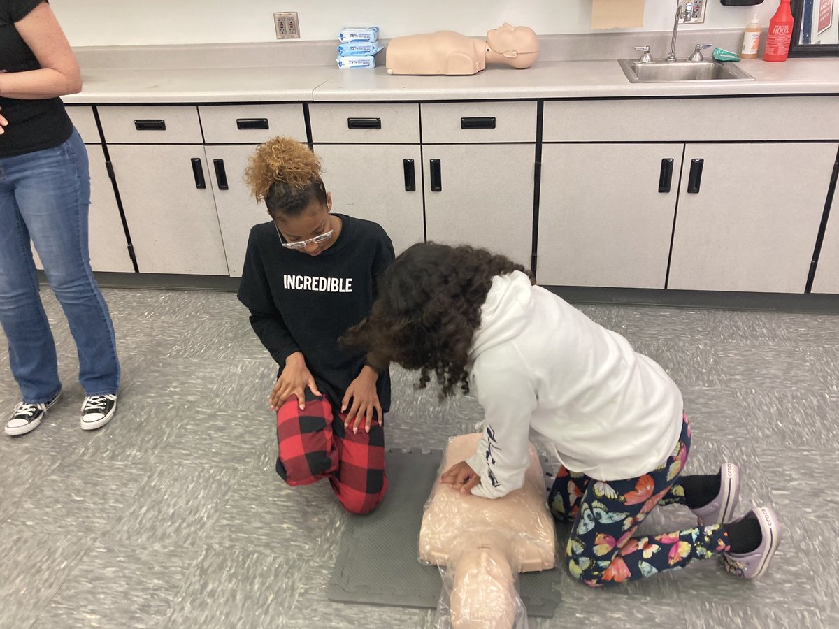 Mrs. Maggie Carey is our highly skilled medical professional and Teacher.  Mrs. Carey taught her students the art of compressions during their CPR lesson &amp; they did a great job!  Thank you, Mrs. Carey. 💛🐾🐾 <a href="/DMSTIGERTWEETS/">Dunnellon Middle School</a>