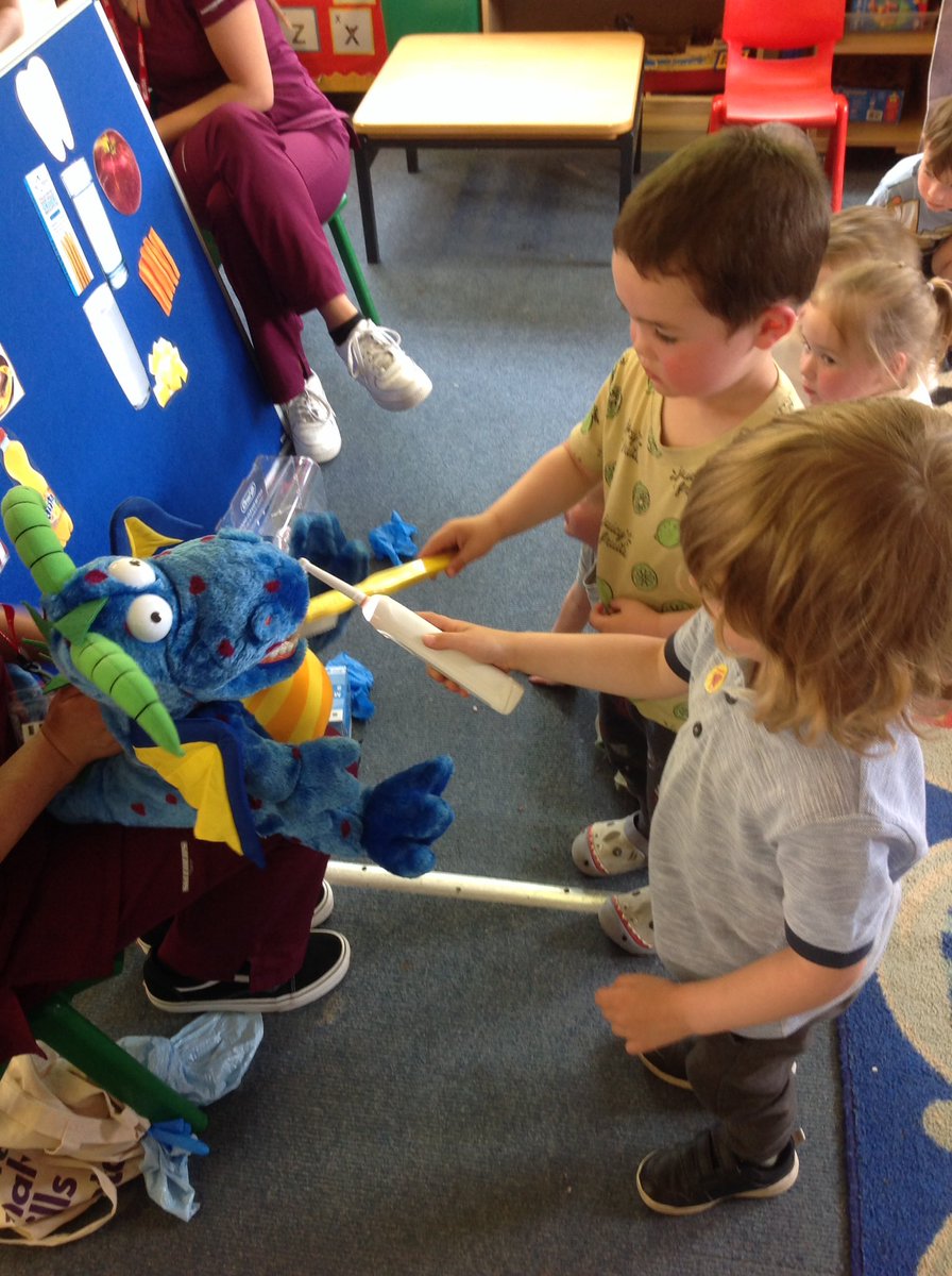 Yesterday we had the dental nurses in Nursery. We got to brush the dragons teeth and talked about what  makes our teeth happy and sad.#EYFS