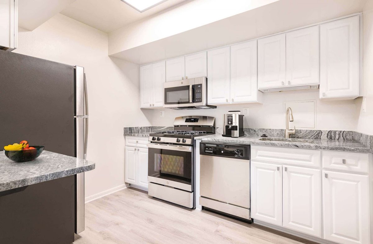 Cook like a pro in our apartments' modern kitchens, featuring granite countertops and quiet close cabinets. The stainless steel appliances add a stylish touch to your culinary creations. Share your favorite recipes and tag us with #modernkitchen.