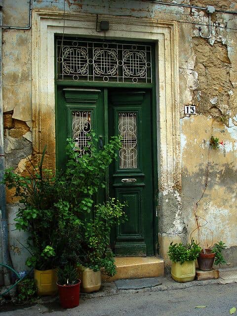 Down but not out!/A bit of tender loving care would make this #Cypriot door and wall majestic again/Dizleri uzerinde olabilir/ Ama bu #Kibris evi biraz sevgi ve itina ile yeniden eski hasmetine kavusabilir/ Kurtaricilar nerede?/ #Cyprus