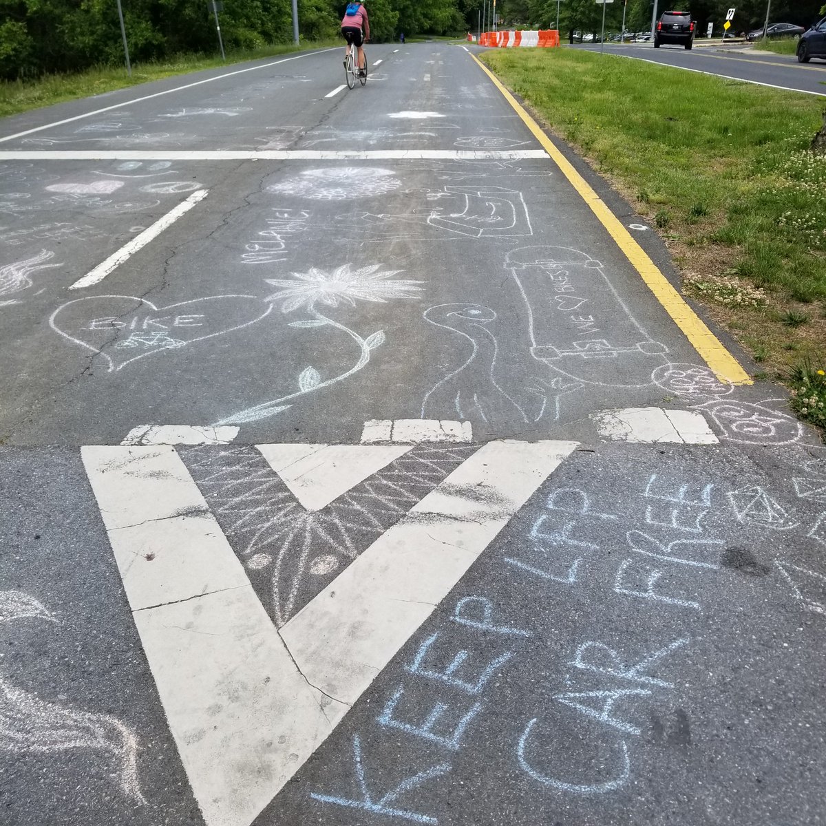 Noisy drivers may show up at hearings. Kids express their views on the Little Falls Pkwy road diet in chalk.