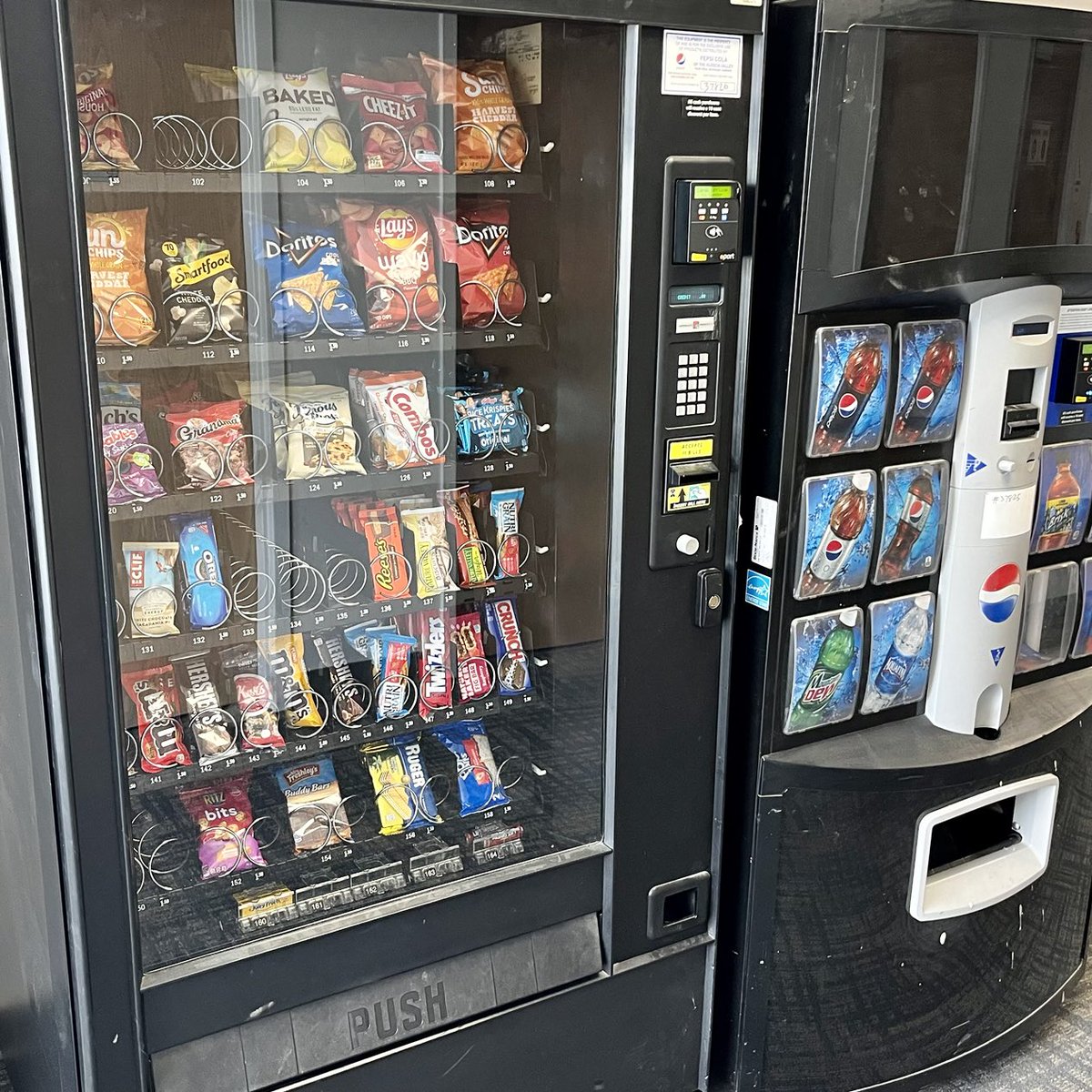 BiggestComeback's tweet photo. Seen this morning in the hall of a local hospital center… 

This doesn’t happen by accident. 

Someone in a position of authority had to decide to have these machines placed here. https://t.co/72p33NGZQ5
