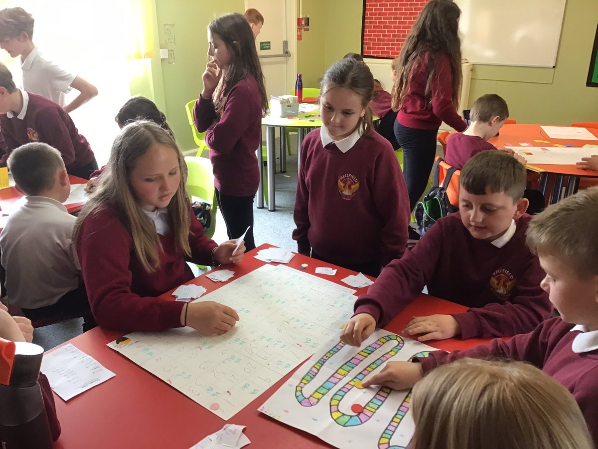 WellfieldMiddle's tweet photo. Year 6 have been working hard on their own mathematical board games recently. Today, they had fun teaching Y5 how to play them! Fantastic communication skills! #WMSMaths #WMS5Cs https://t.co/0XRA64xaji