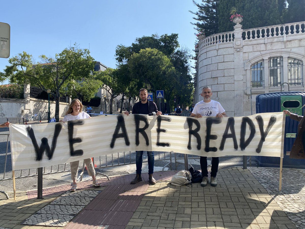 ReigniteFreedom's tweet photo. #weareready 

Standing outside the venue for the Bilderberg Club meeting. Lots of journalists here who are also exposing them! 

Police ordered us to put away the banner…crazy! 

Massive event tomorrow in Lisbon and all over the world - https://t.co/m0GppbfSx0 https://t.co/cIjEfA3fJS