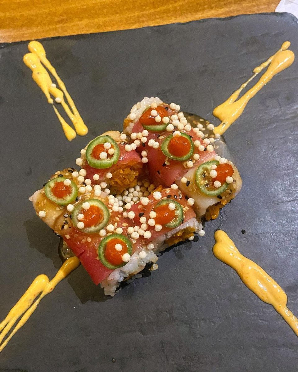 Mesmerizing flavors, exquisite presentation - Eight Sushi Lounge's Burlesque Roll an explosion of flavor of spicy yellowtail and crunch, topped with escolar, tuna, miso, rice pearl and serrano pepper. #sushi #foodiefriday #atlfoodie #atleats