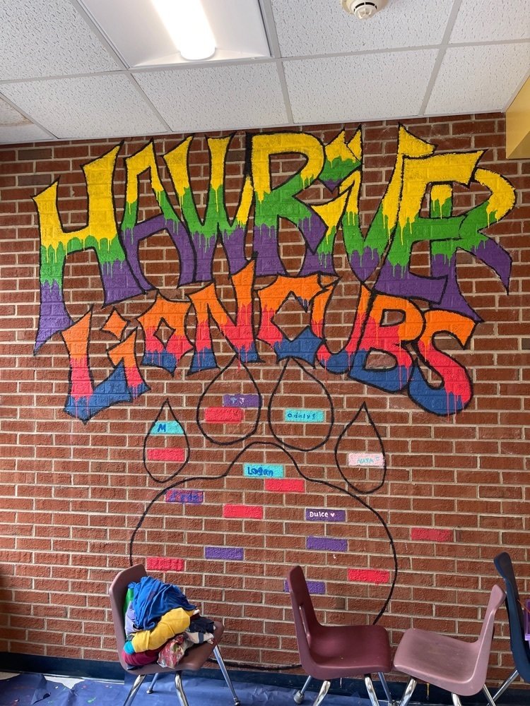 HRE_lion_cubs's tweet photo. Our Student Lighthouse synergized to add this mural to our 4/5 hallway. Our 5th grade students will leave their "mark" on a brick in the paw print! #StudentCenteredFutureFocused #LionCubsLeadTheWay🖤💛 #LeaderInMeHRE https://t.co/8lkgT96h8Z