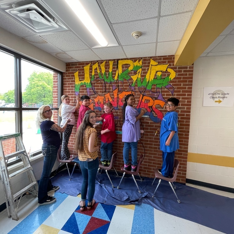 HRE_lion_cubs's tweet photo. Our Student Lighthouse synergized to add this mural to our 4/5 hallway. Our 5th grade students will leave their "mark" on a brick in the paw print! #StudentCenteredFutureFocused #LionCubsLeadTheWay🖤💛 #LeaderInMeHRE https://t.co/8lkgT96h8Z