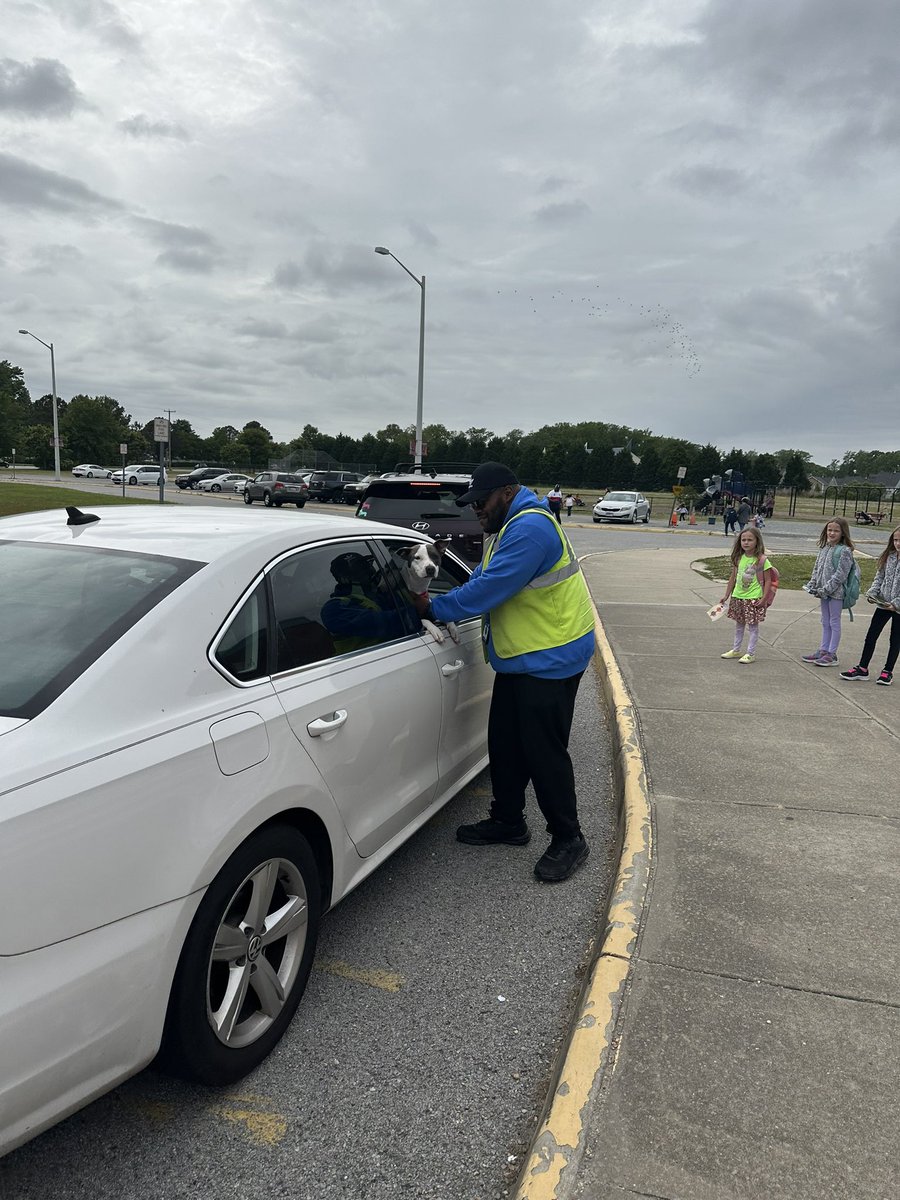 Mr. Walker, CES Safety Monitor, loves all CES family members- especially the 4 legged ones! #BuildingthebestSPS #GrowinggreatGators #LoveDogs