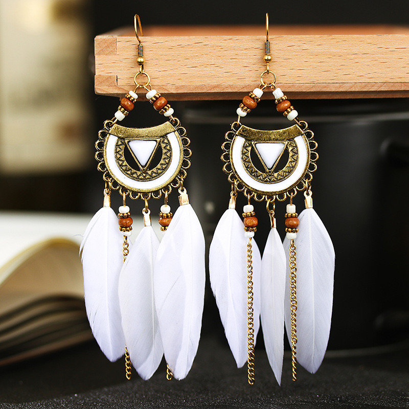 Excited to share the latest addition to my #etsy shop: Wish Supply Semi-circular Alloy Feather Earrings European And American Popular Long Rice Bead Earrings IEthnic Style Jewelry etsy.me/45kkg5w #women #earrings #ethnicearrings #longearrings #featherearrings #