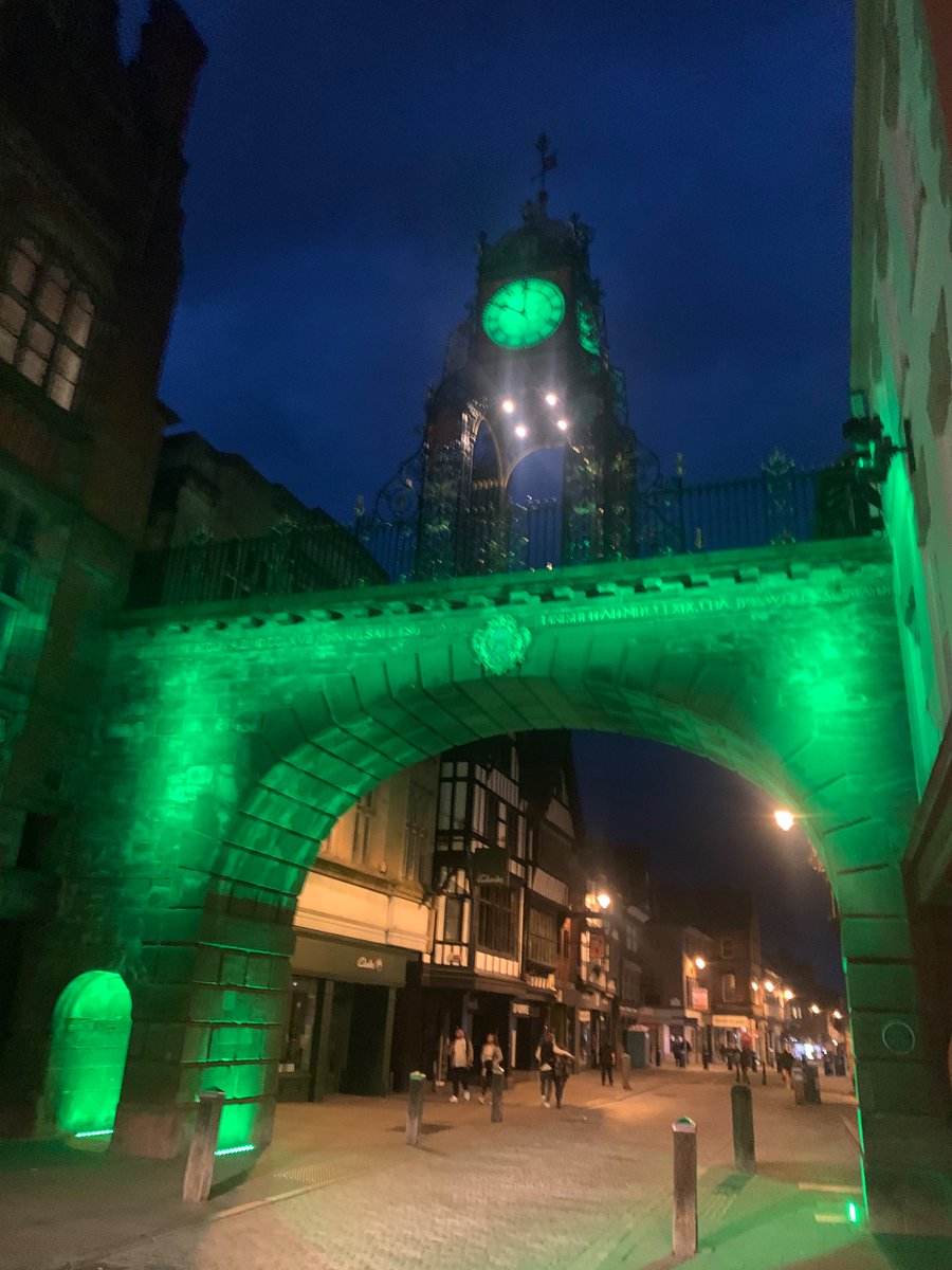 chestertourist's tweet photo. The Eastgate Clock is all green this evening. https://t.co/qxZAtxCsmE