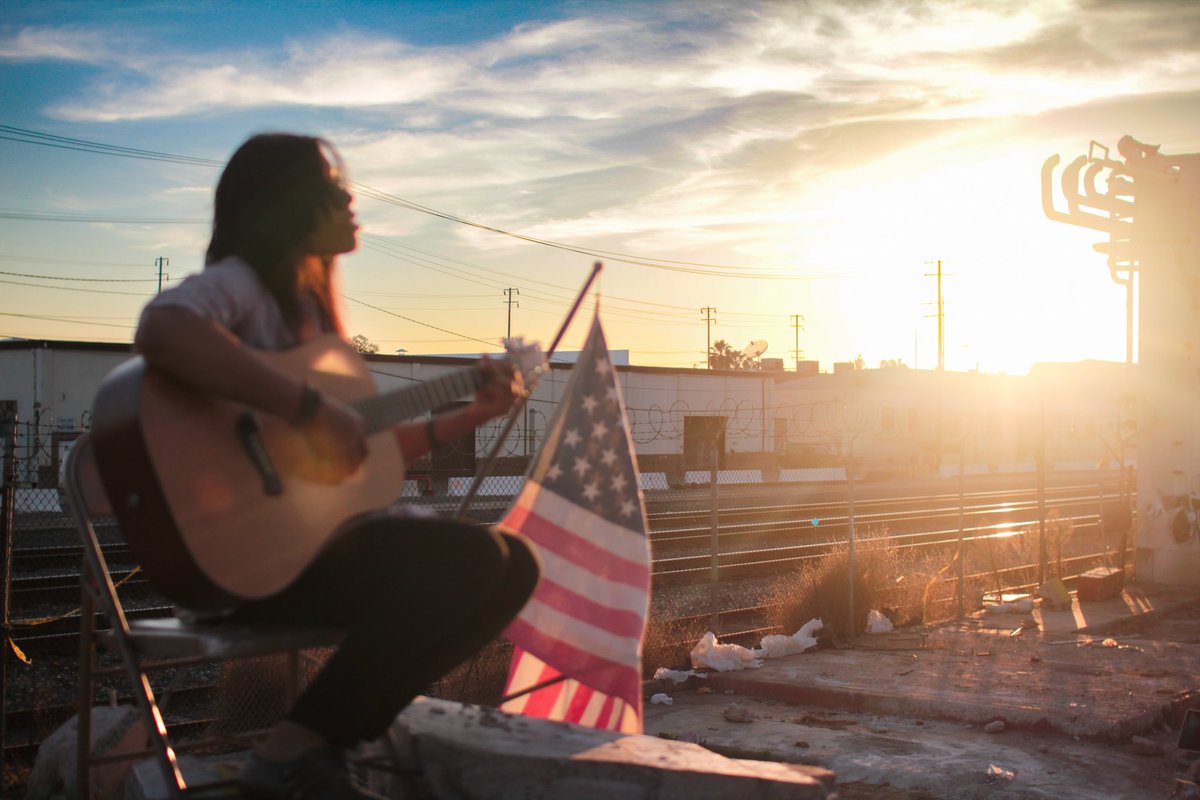 nicholesmith's tweet photo. Railroad Tracks - Fullerton, California (2011) 📸: @Monkwood 
#CaliforniaUSA #sunset #guitar #americanflag #USA #OrangeCounty https://t.co/9iWSXzUA6n