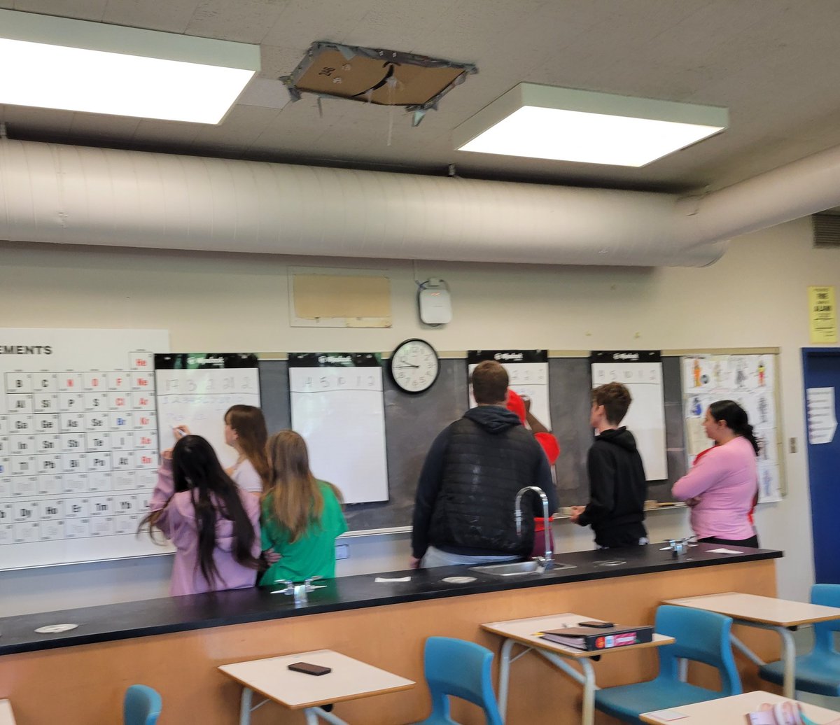 Today we put theory to practice thanks to @pgliljedahl and his encouraging and motivating PD yesterday! Standing is always good, sitting... not so much. Another key = using 1 marker ... lots of pointing happening :) @StPaulOCSB #thinkingclassroom #mathematics #verticallearning