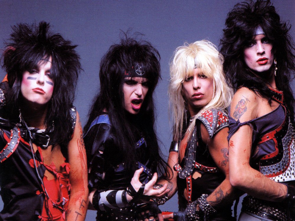 Mick Mars, showing off the size of his ballsac, the only balls in Motley Crue.
