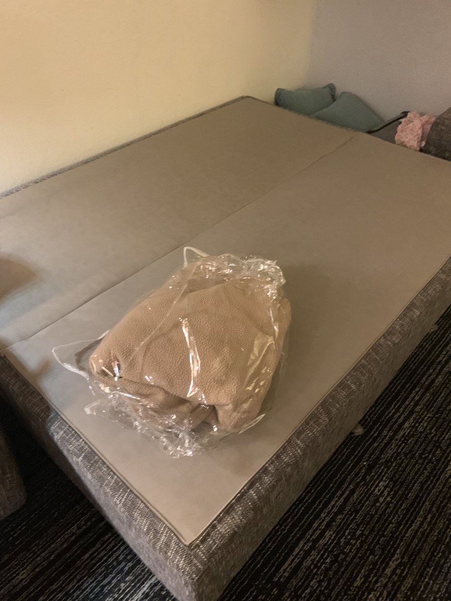 KHartOBrien's tweet photo. This is what @Marriott considers a bed. No mattress, no sheets, no pillow.     Frame and blanket. https://t.co/mfUKPFPnbf