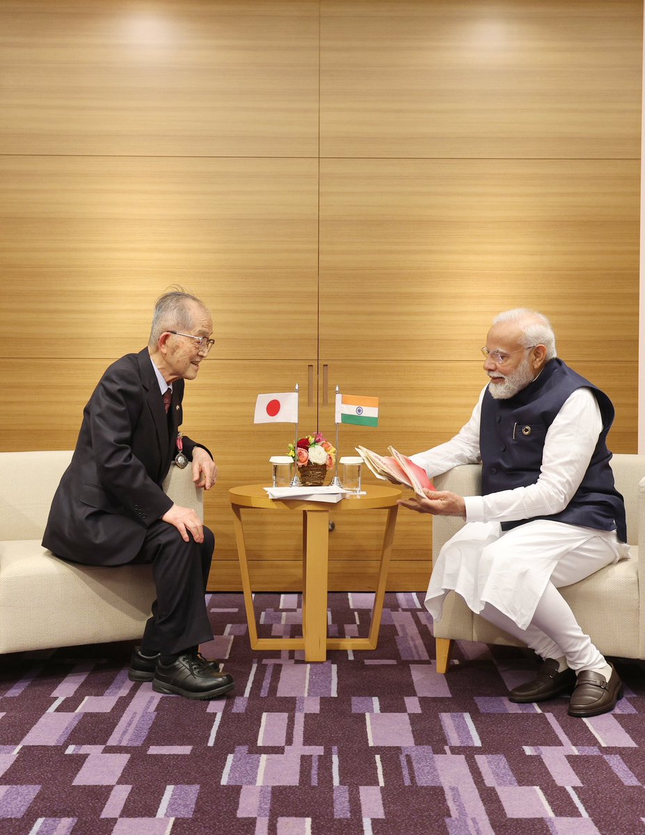 narendramodi's tweet photo. In Hiroshima, I was glad to interact with Professor Tomio Mizokami. A Padma Awardee, he is a distinguished Hindi and Punjabi linguist. He has made numerous efforts to make Indian culture and literature popular among the people of Japan. https://t.co/mEWYZLr62F