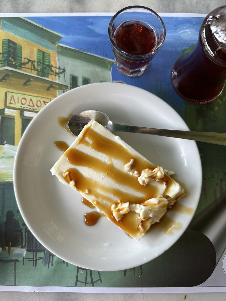 After all of that hiking and walking, I enjoyed a big Greek salad.  It was so delicious.  Juicy, ripe tomatoes and creamy, tangy feta.

I got some complementary panna cotta and a red wine drink with the check!