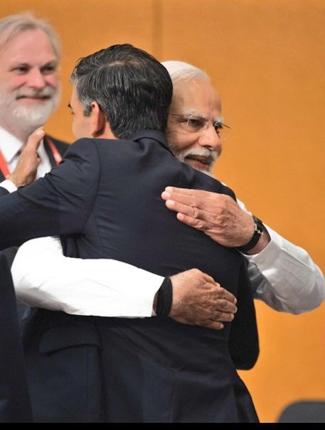 BJP4India's tweet photo. Prime Minister Shri @narendramodi shares warm hug with the UK PM Rishi Sunak as they meet in Hiroshima, Japan. https://t.co/WJnExSd8YL