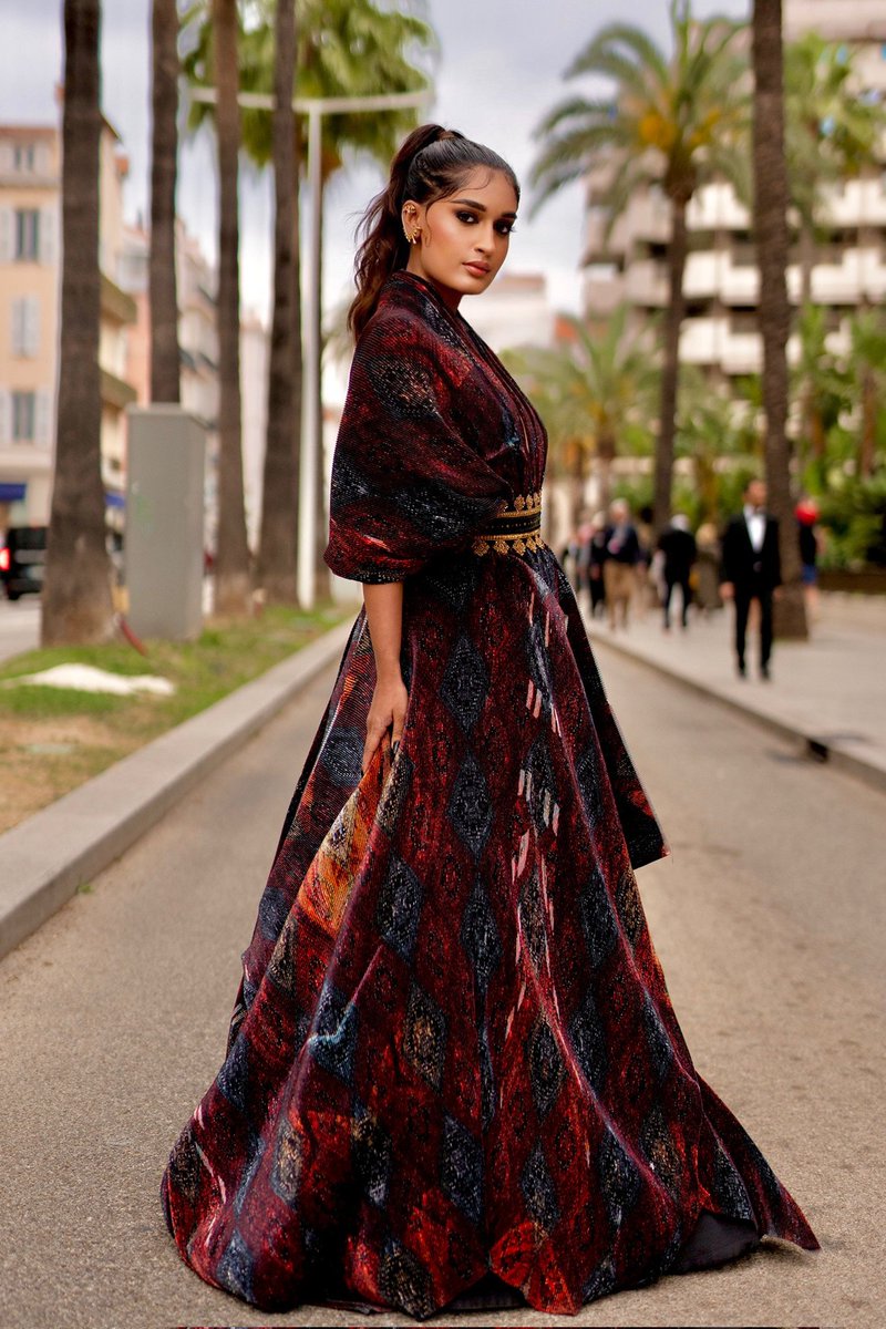 Indian Content Creator- #NiharikaNM who is attending the #Cannes2023 Film Festival for the second year in a row shared pictures from her first day at the event.  The influencer who is exclusively wearing designer duo @ShantanuNikhil opted for retro Egyptian vibes