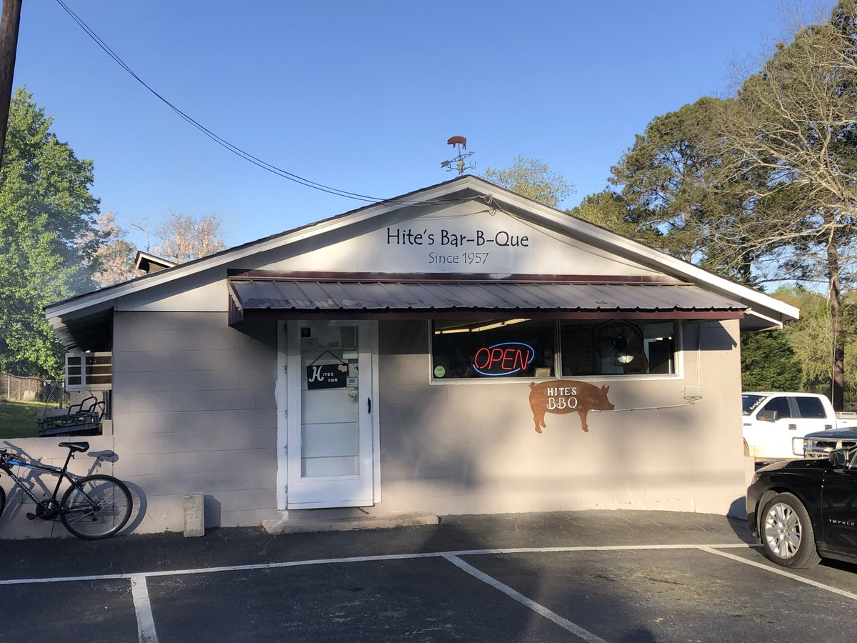 Whole Hog barbecue with mustard sauce and a side of baked beans with hash rice at Hite’s Bar-B-Que in West Colombia, South Carolina. Since 1957.