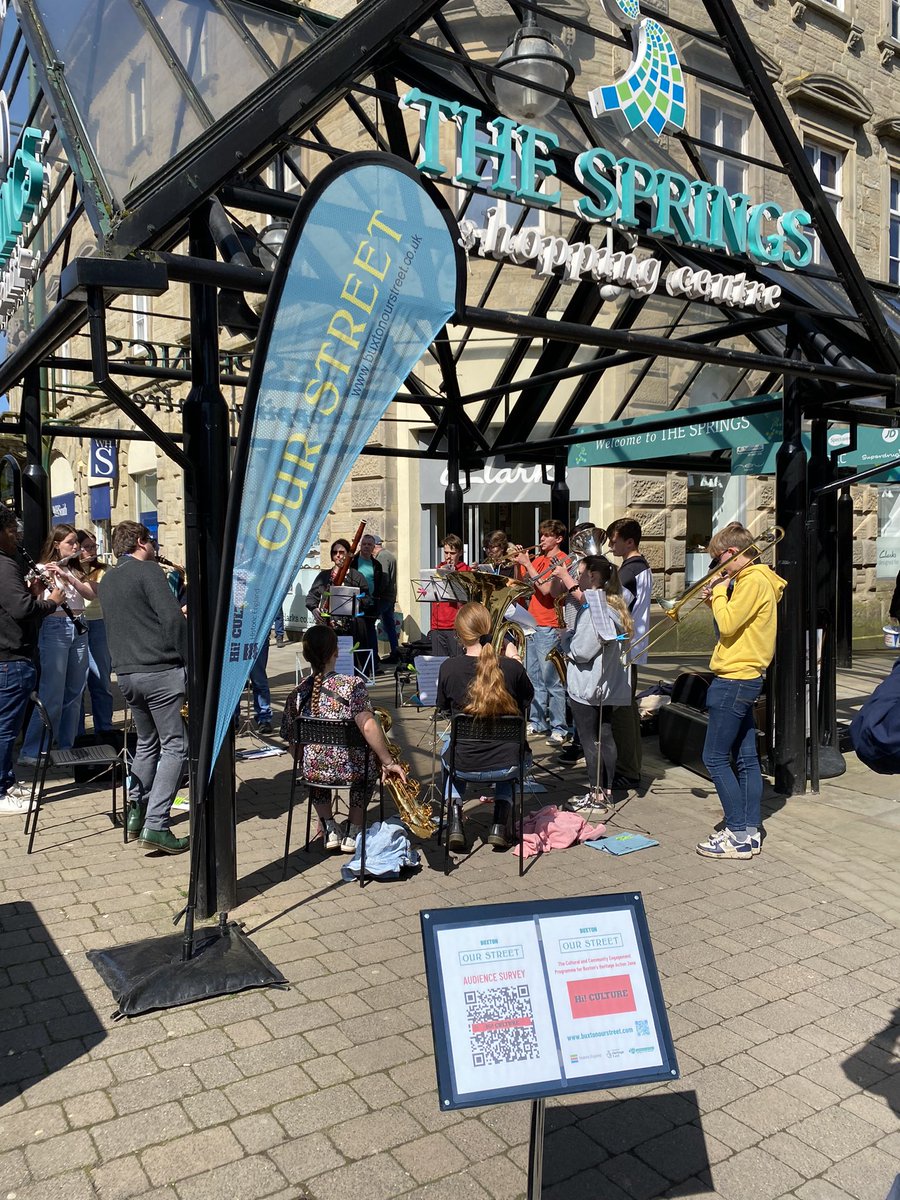 A beautiful day for al fresco music! The senior wind band from @PeakDistrictMus, joined by members of @NCO01 are playing on #SpringGardens #Buxton  
  
Come down and catch them!
 
#BuxtonHAZ #HSHAZ #BuxtonOurStreet 
 
@HistoricEngland @HighPeakBC @Buxton_News @VisitBuxton