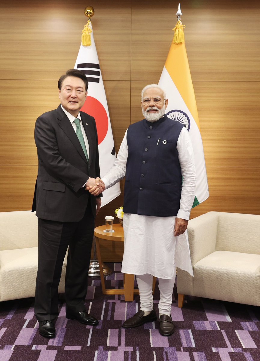 narendramodi's tweet photo. Delighted to have met @President_KR Yoon Suk Yeol. We talked about ways to enhance cooperation in futuristic sectors like IT, innovation, technology, semiconductors and more. Boosting commercial linkages and defence ties also featured prominently in the discussions. https://t.co/j097EFRBQX