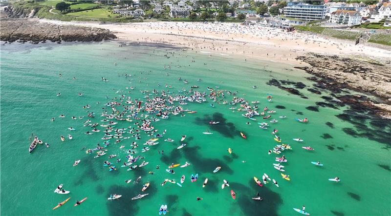 Thousands of #OceanActivists took to beaches and rivers up & down the country today to take part in a mass Paddle Out Protest organised by @sascampaigns 🪧🌊✊

Their message was loud and clear: the UK's water companies must #EndSewagePollution now 💩❌

📸 Credit: Droneman