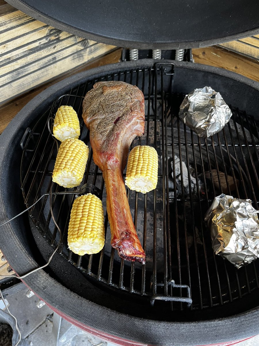littlespabbq's tweet photo. Tomahawk steak, reverse seared in Kamado bono, smoked with hickory, served with jacket potato and sweetcorn.. bloody lovely. #kamadobono #ukbbq #bbquk https://t.co/pVf1pGMdyw