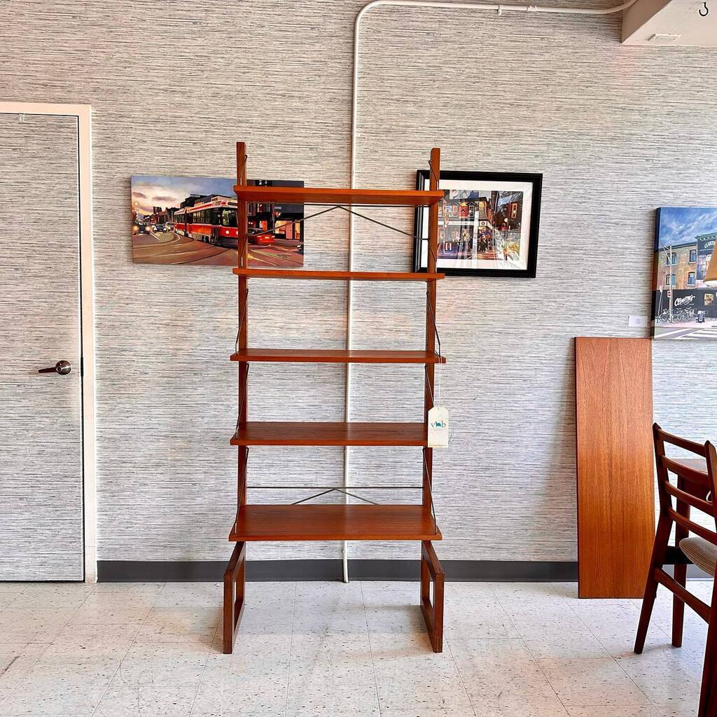 Single section. Free standing wall unit by Poul Cadovius. All shelves are modular, allowing you to customize for your needs.

Matching unit with bar also available 

✅ 🇨🇦 wide shipping
✅ Refunds for 7 days on full priced, non-custom furniture.
✅ Rest… instagr.am/p/CseAZQMg0IY/