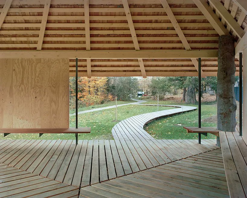 designboom's tweet photo. charly jolliet's 'umbrella pavilion in switzerland combines traditional wood cladding + modern volumetry. https://t.co/lY8KufRmZc https://t.co/gRmf8lltuL