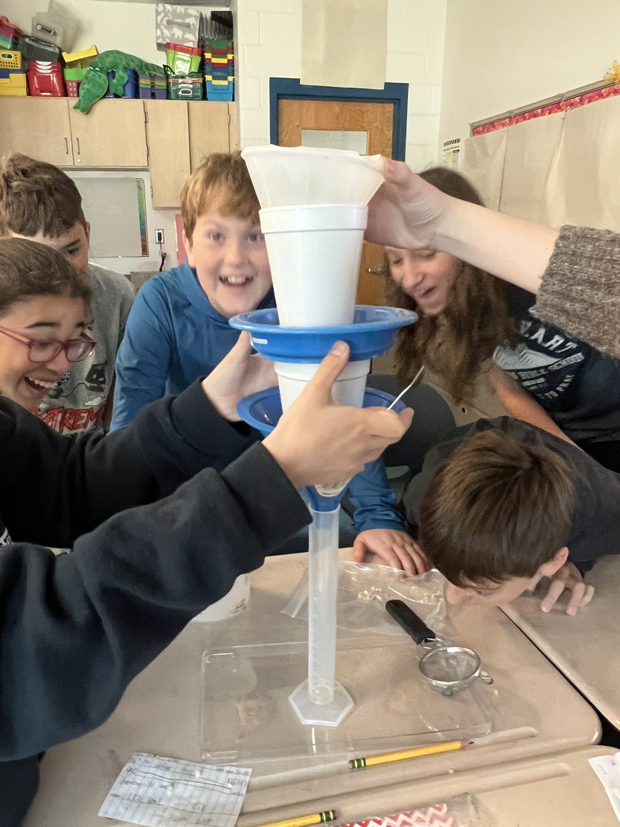 Science Excites! Team faces tell the story as water comes out of their filter.💧💦