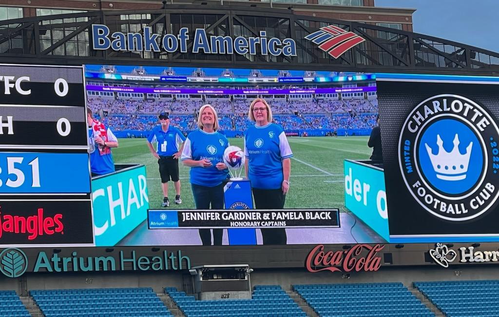 AtriumMSKI's tweet photo. Jennifer Gardner, @AtriumMSKI AVP overseeing sports partnerships, athletic training and event medicine, along with Pamela Black,  sports medicine care manager, were honored at the @CharlotteFC game for their dedication to spectator and player care! Congrats Pam &amp; Jennifer! ⚽️❤️🩺 https://t.co/VGoz9RXqnH