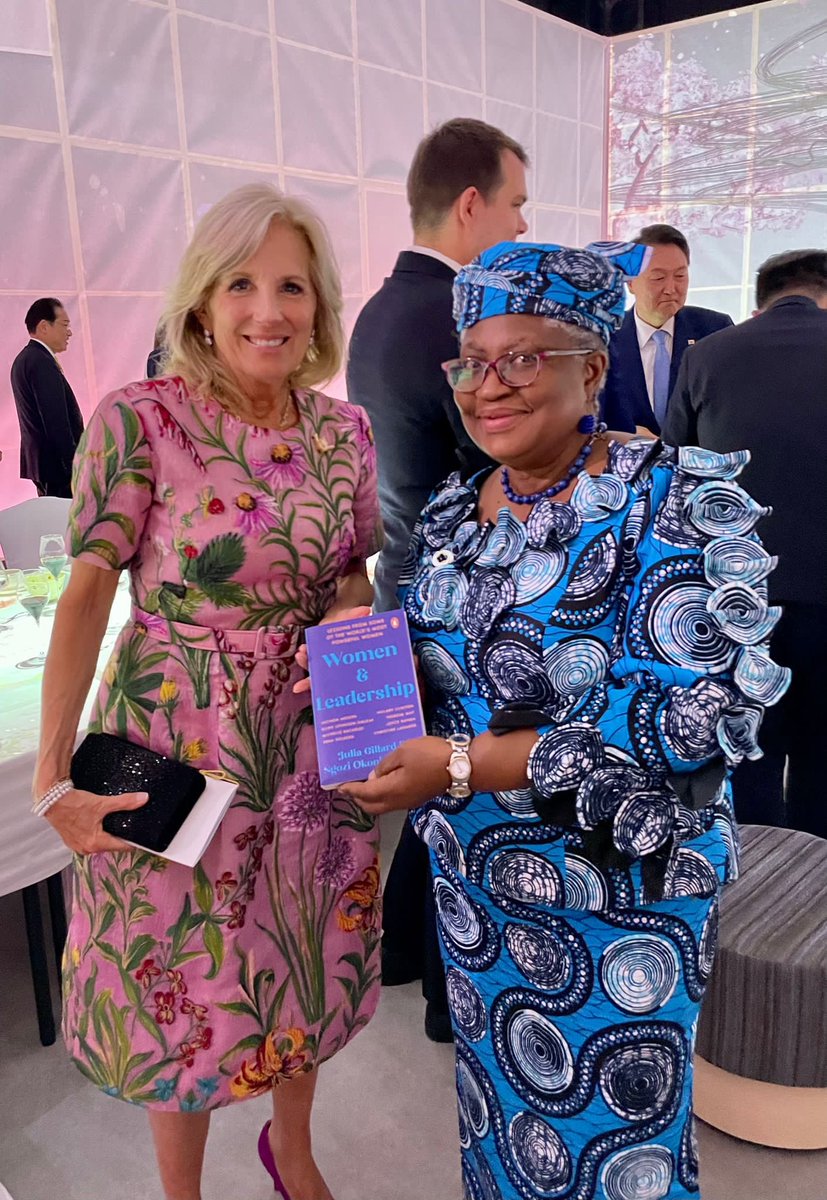 NOIweala's tweet image. With H.E President @JoeBiden @POTUS at the #G7Summit. Thank you Mr President for your leadership on ratification of the Fisheries Subsidies Agreement and willingness to support @wto reform. Also sharing my book “Women and Leadership” with First Lady @DrBiden