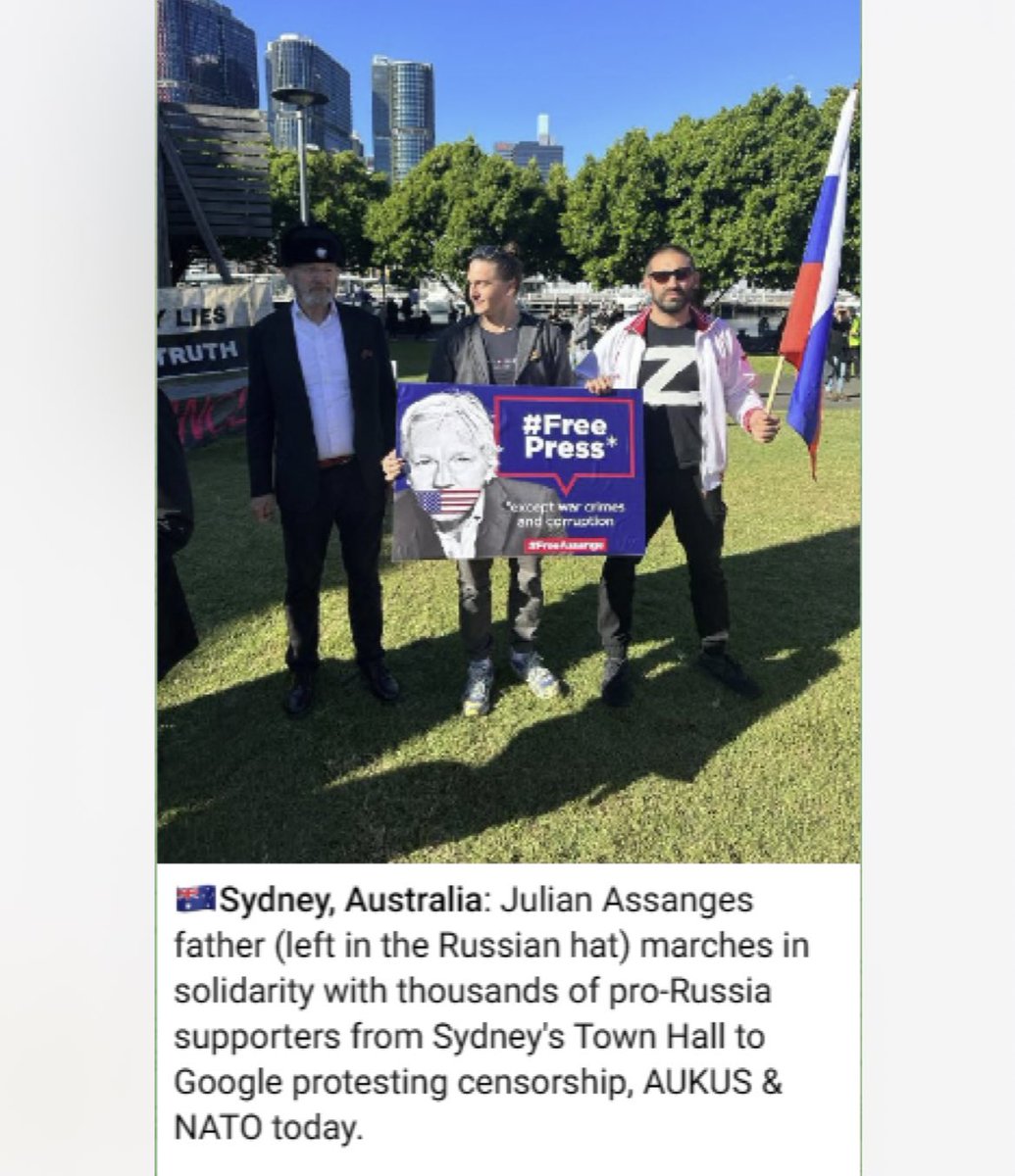 NotMickyAtko's tweet photo. MickAtko: RT @DrewPavlou: Julian Assange’s father John Shipton takes a photo with Russian Z war supporters in Sydney. Okay, that’s enough, no more sympathy for the evil Assange movement. They support war crimes and invasion of sovereign nations when it s… https://t.co/l8slbqyxxr