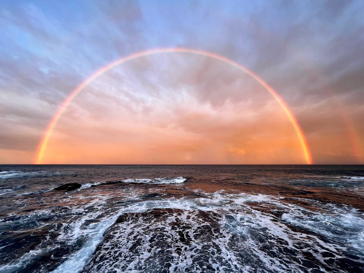 A a rainbow with its feet planted firmly on the water. #Sydney #coast #rainbow