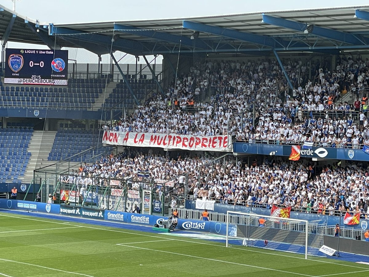 BasileBrigandet's tweet photo. En cours de rachat par Chelsea, les supporters strasbourgeois déploient cette affiche applaudie par les supporters troyens déjà sous l’emprise du City Group. #ESTACRCSA https://t.co/LaqEt6W3h6