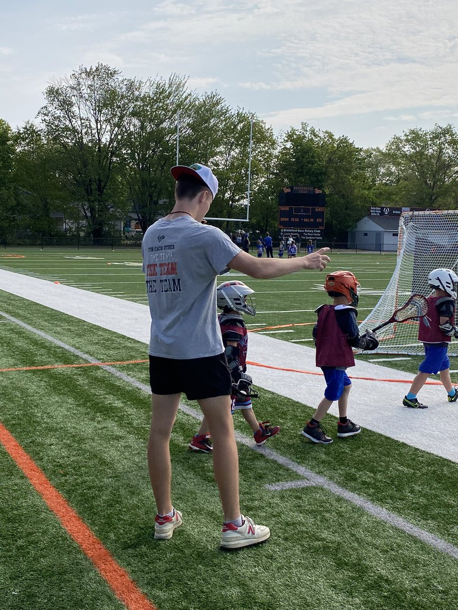 BHS lacrosse program volunteering at the youth lacrosse camp this morning!  Great job!