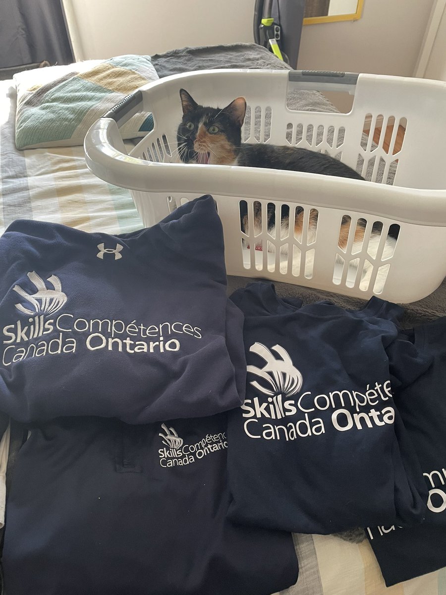 Packing for #SCNC2023 and Nala is shocked at how much @skillsontario wear I have! Getting excited to fly to Winnipeg with #TeamWhat?! #TeamO #TeamOntario ✈️