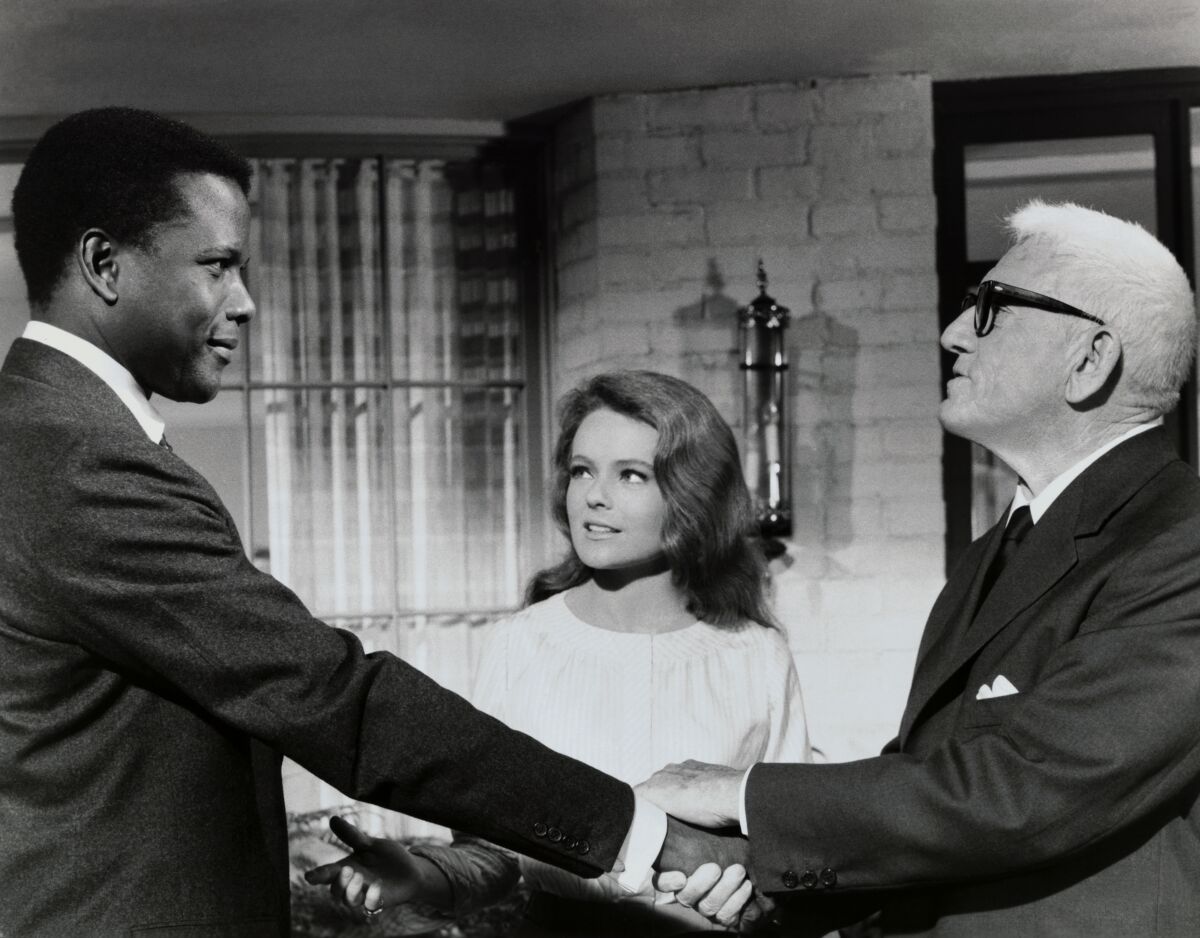 Sidney Poitier with Katharine Houghton and Spencer Tracy in Guess Who's Coming to Dinner (1967). #ClassicGuyOfTheWeek #SidneyPoitier