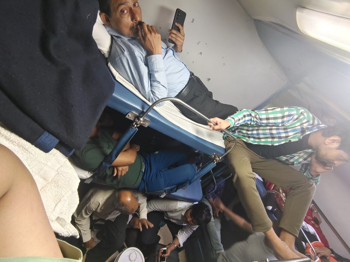 ShashiShankarM3's tweet photo. Now it is difficult to travel even in an AC coach, even AC has become a sleeper coach. TT allowed the passenger to sit. Those who have seats there are getting into trouble, they can't even sleep comfortably. Great indian railway. Train no.12304
coach B1 
#DOSOMETHING https://t.co/xeG648B73X