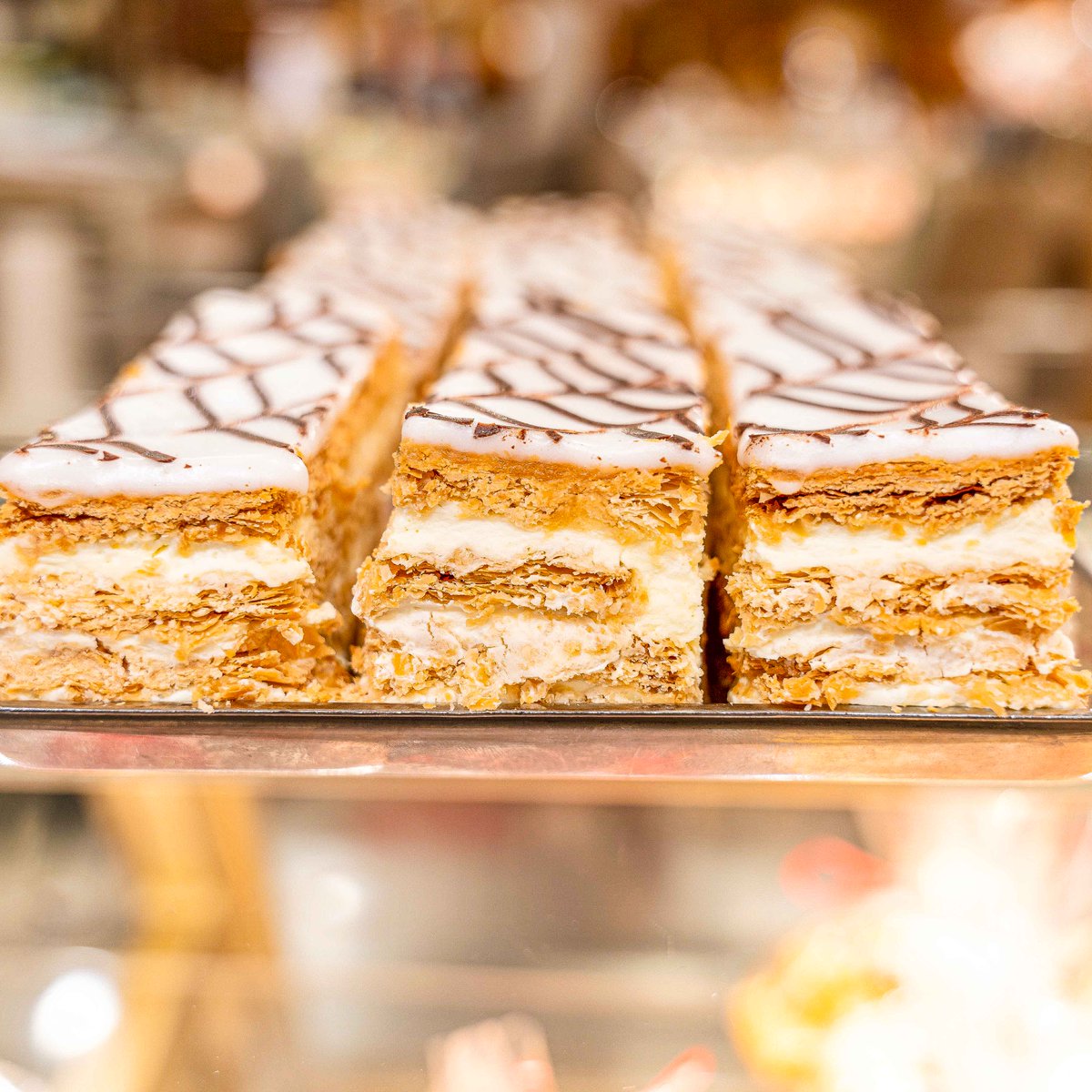 Have you tried our Napoleon? Featuring layers of flaky pastry and sweet Bavarian cream -- plus royal icing for an extra-special touch -- it's no wonder why this dessert is so popular! #FerraraNYC