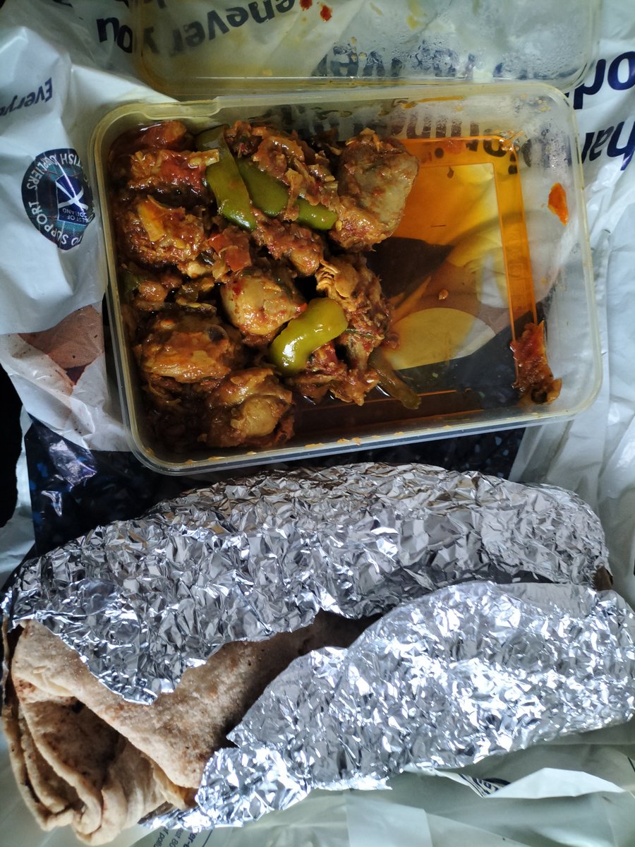 Sensing my distress he asked if I wanted something to eat. I was half-dead by then and said yes. He then took is lunch from the fridge, warmed it up and gave it to me. This chapati and chicken is the most delicious thing I've had in ages! 3/