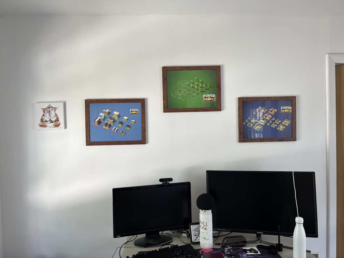 PttPGame's tweet photo. 3D artist @ToddOnTweet is beaming with pride! Look at what he has on his wall: a mini art gallery featuring his masterpieces from the game! 🖼️⚡️ Nothing like electrifying #art that powers up your imagination! #IndieDev #GameDev #GameArt #3DArt https://t.co/A8ghr7IRJP