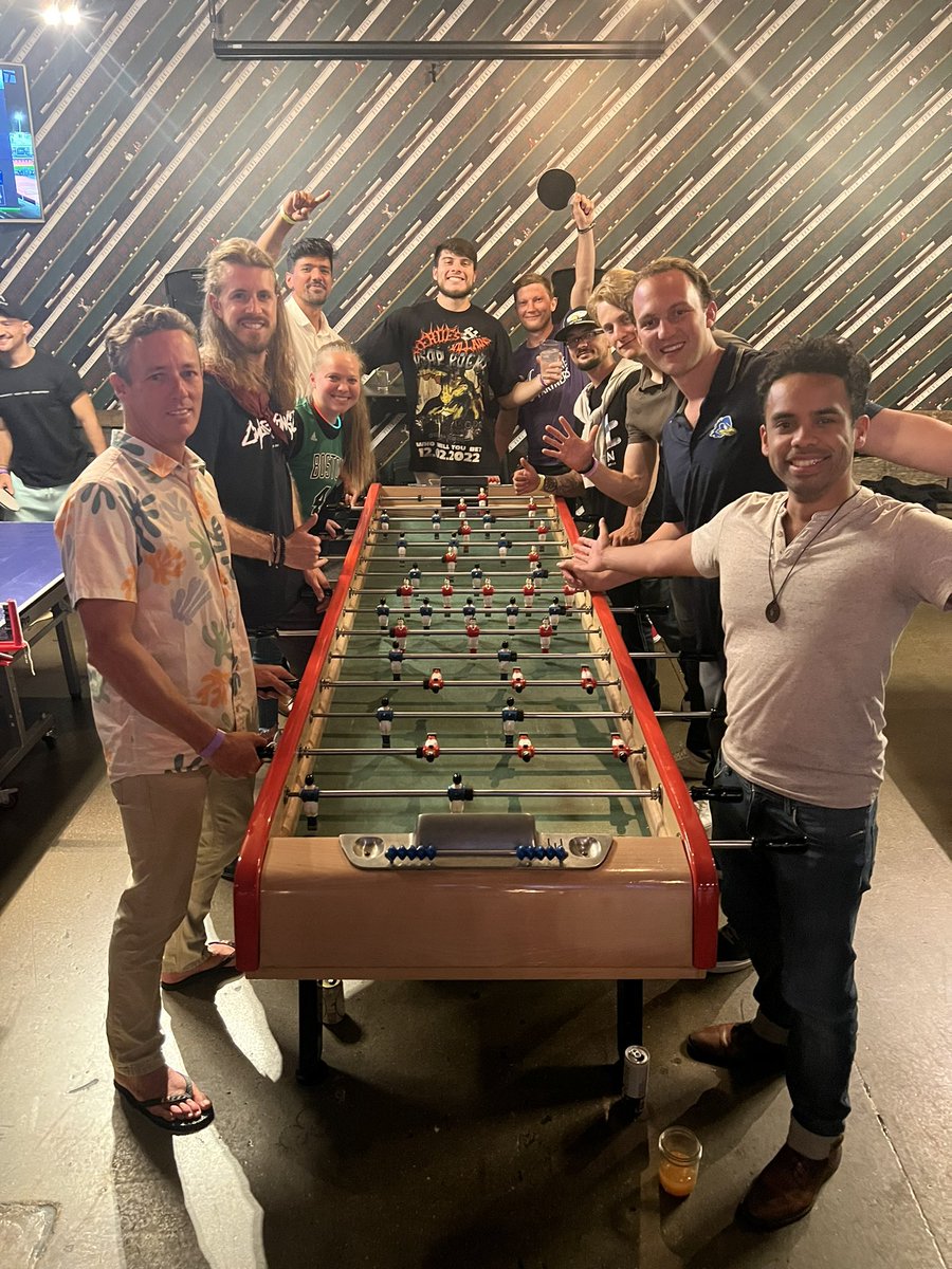 KamokaJosh's tweet photo. Massive THANK YOU to @shivaiyar for throwing a party for the ages. Man what a blast!! Here's a little Foosball battle that went until a quiz kid stepped in to save @loicRambo and Co. 😭😂@becerratops @Crypto_futur3 @taek2212 @LizZakos @garyvee #VeeCon #VeeFriends https://t.co/DTXaVXjPgD
