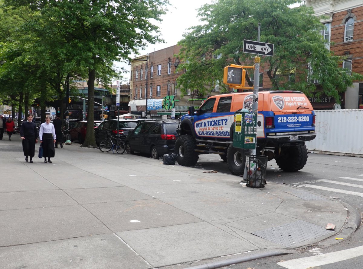 How is it legal for this sociopath to drive this thing around the crowded streets of the city? His hood is almost as high as my head.