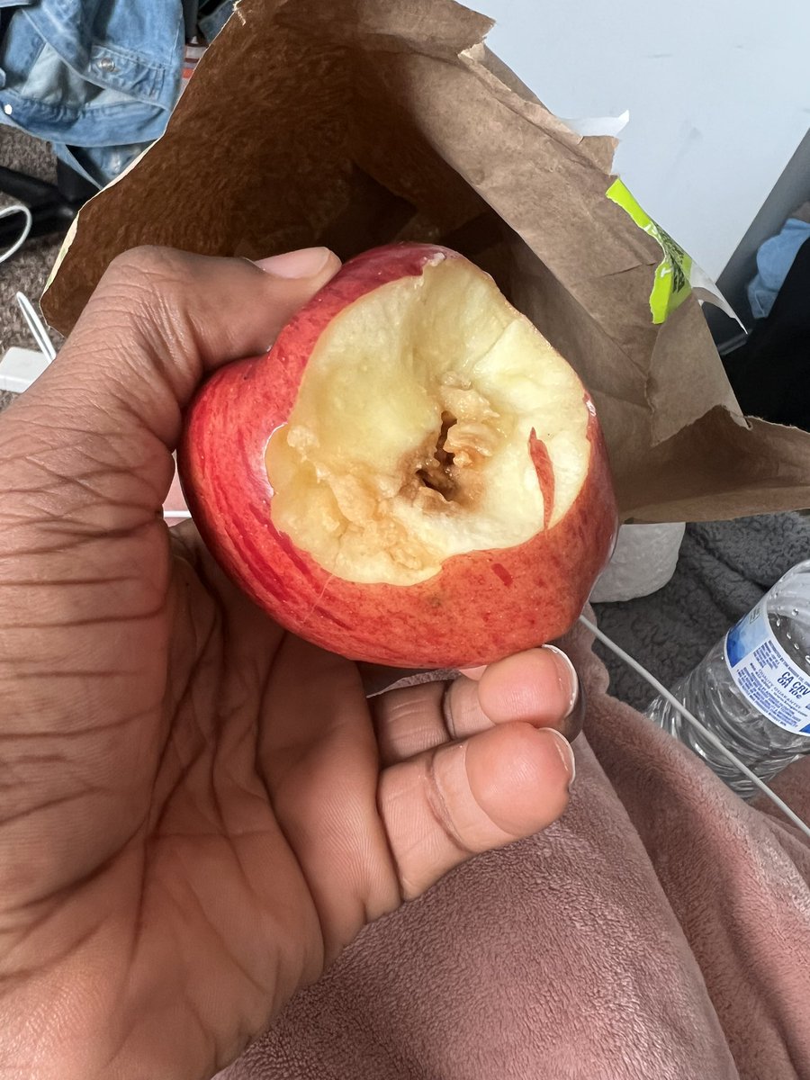 IamTyBanks's tweet photo. I was feeling under the weather so I purchased a “healthy” meal from @panerabread and bit into the apple that came as a side and this is what happened. #WTH https://t.co/xoeFdPGoAc