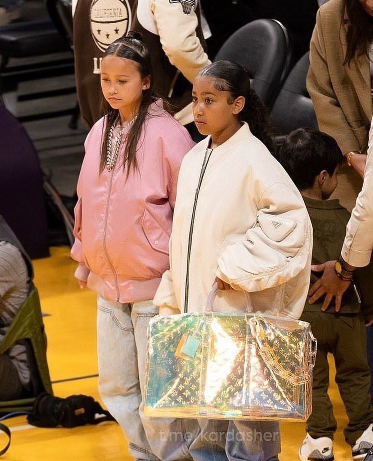 North West Attended the Lakers Game in an Off White Prada Bomber jacket  with Virgil Abloh Louis Vuitton Duffle bag – Fashion Bomb Daily