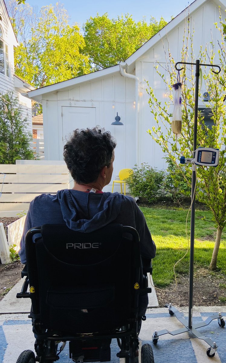 bsw5020's tweet image. This is ALS. A 42 year old father sitting on the back porch in his wheelchair being fed by a feeding tube.

The good news is I am still alive and listening to an amazing audiobook.