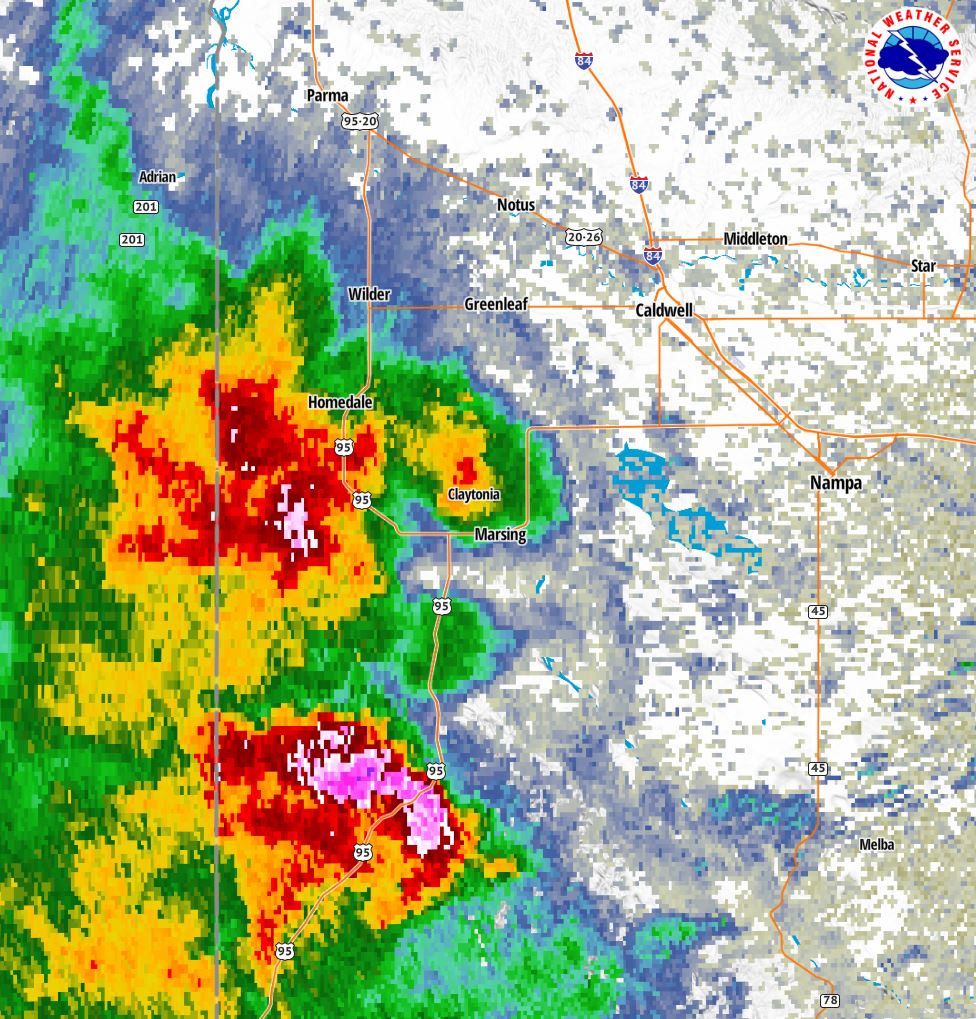 NWSBoise's tweet photo. Severe Thunderstorm crossing Highway 95. 1.5" hail in the core of these storms (magenta). #idwx #orwx https://t.co/clobLqZzja