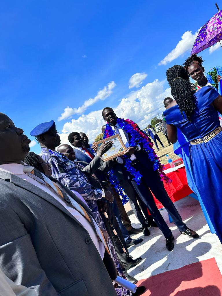 Dr. Daniel Kon Ater, Ph.D. handed me a certificate of victory in the official unveiling of public services. So help me God.